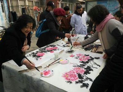 雷锋精神在社区绽放 首都艺术家志愿服务与文化交流温暖春意盎然